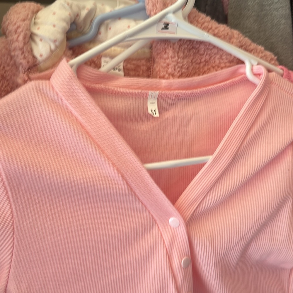 Pink body suit